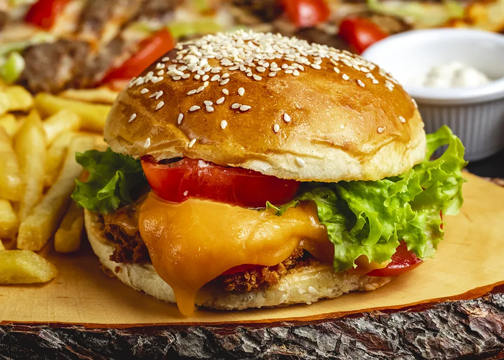 side-view-chicken-burger-deep-fired-chicken-fillet-with-tomato-cheese-lettuce-burger-buns