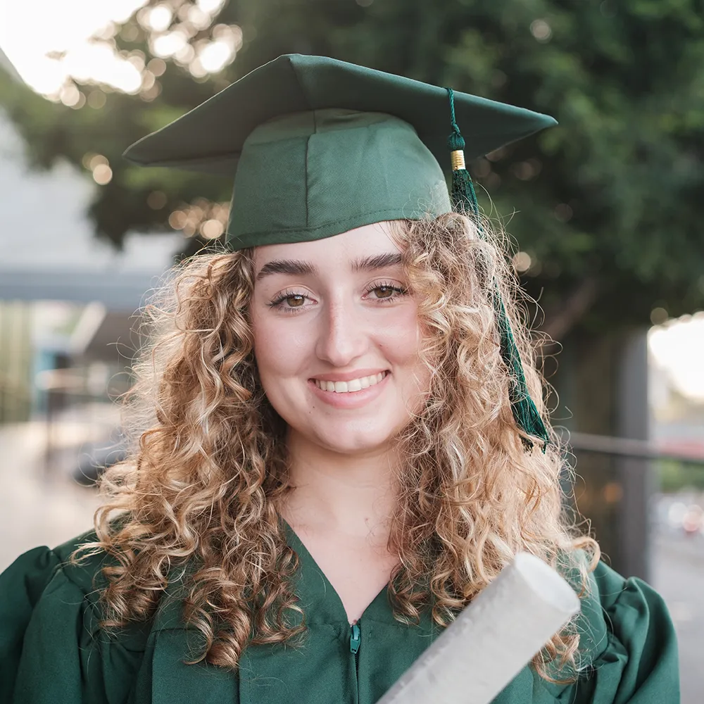 smiling-young-woman-with-university-degree-her-hands-her-graduation-day-concept-studies